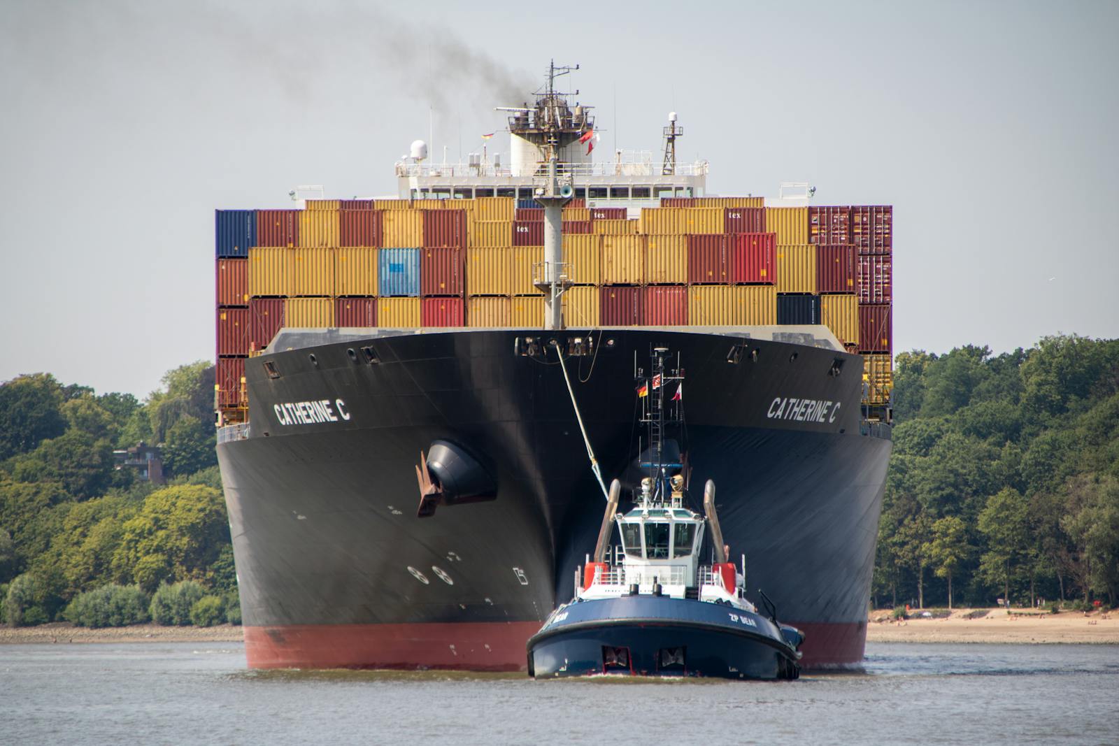 Container vessel and stacked cargo containers representing ocean freight from Mombasa